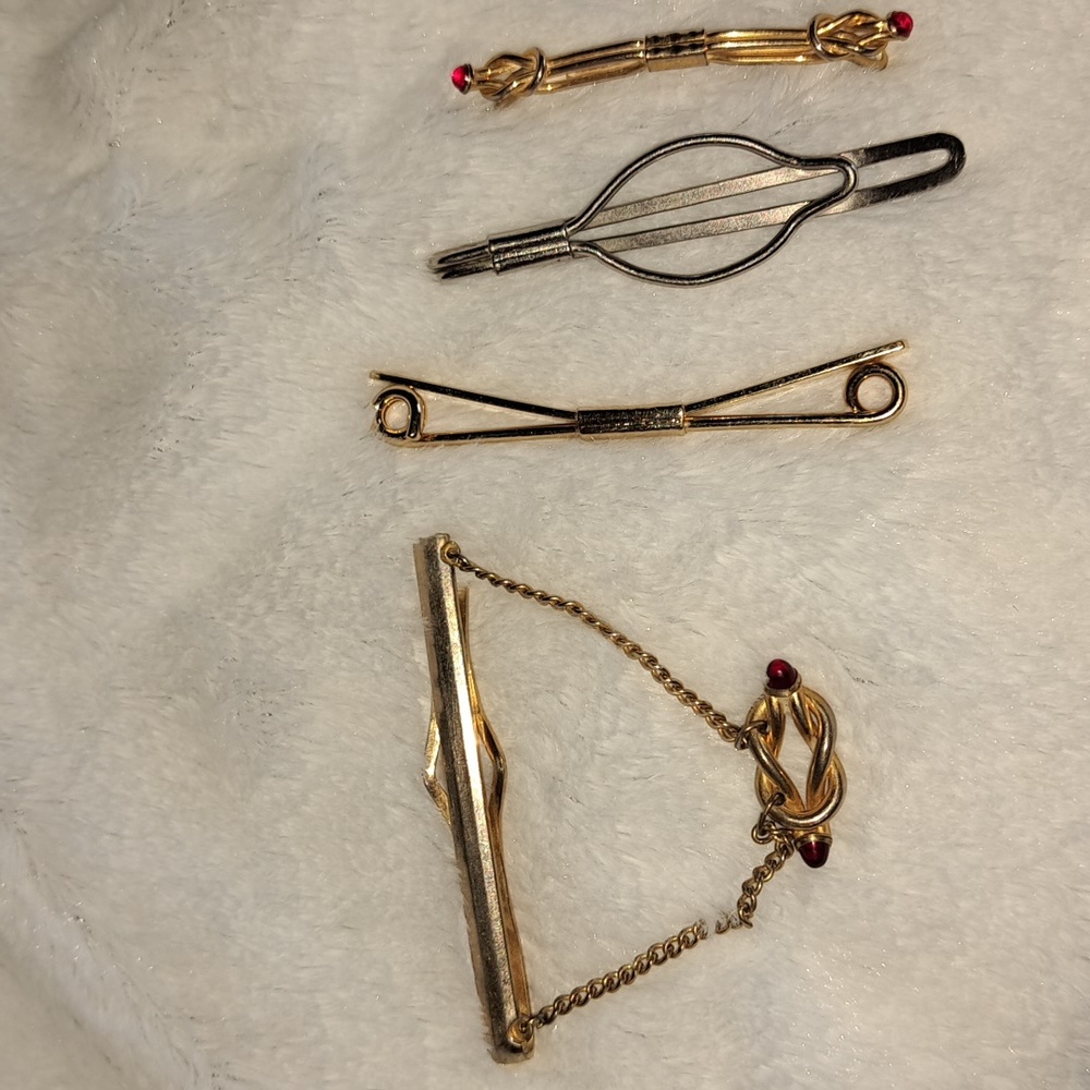 Vintage tie clasps.  From the 60s
